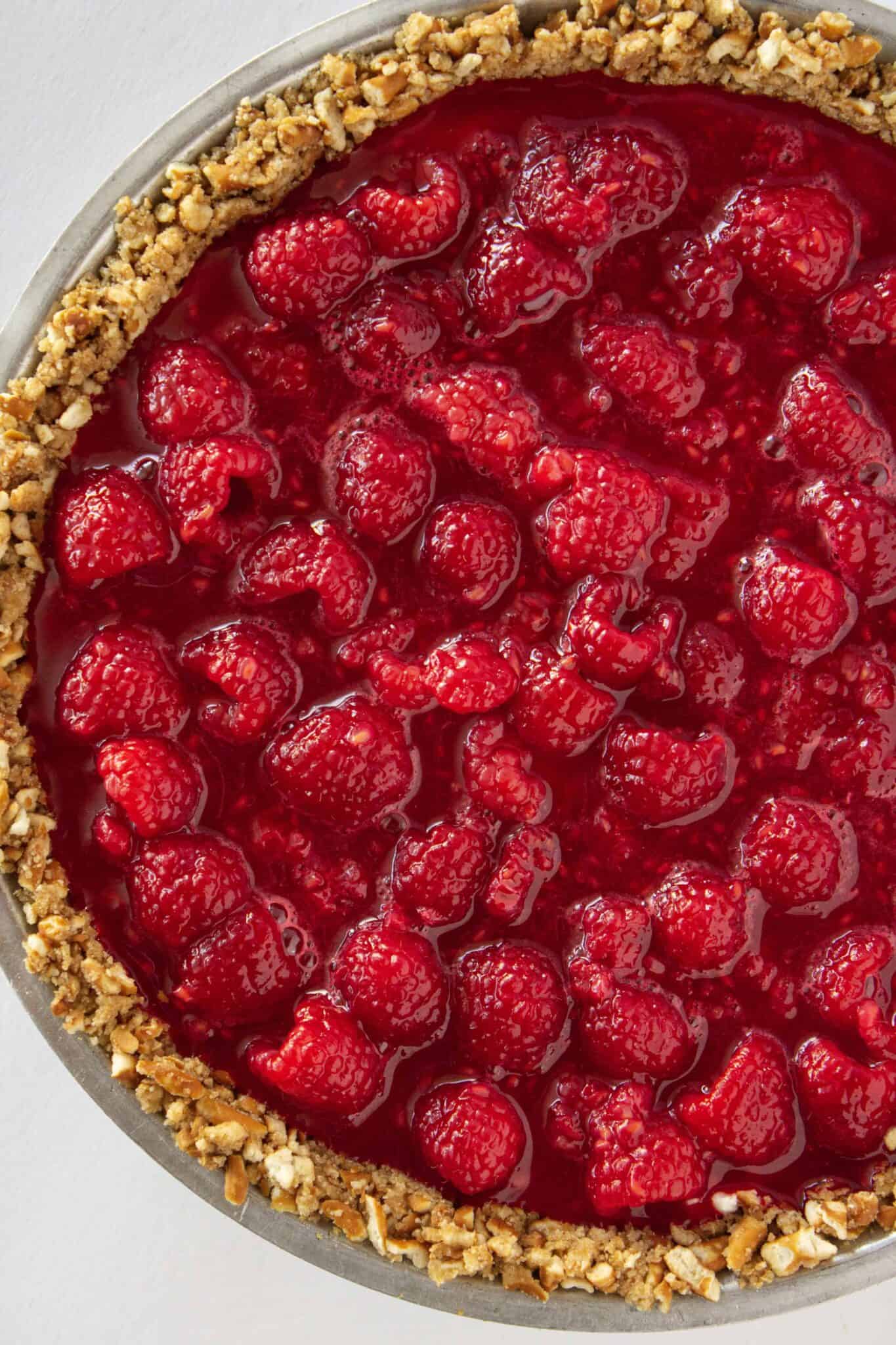No Bake Raspberry Pretzel Pie Recipe featured by top US dessert blogger, Practically Homemade