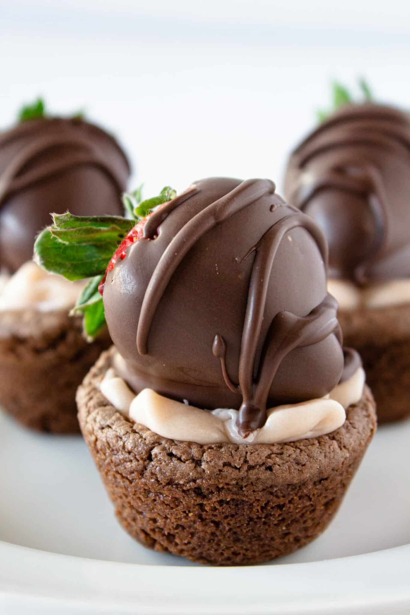 Chocolate Covered Strawberry Cookie Cups Recipe featured by top US cookie blogger, Practically Homemade