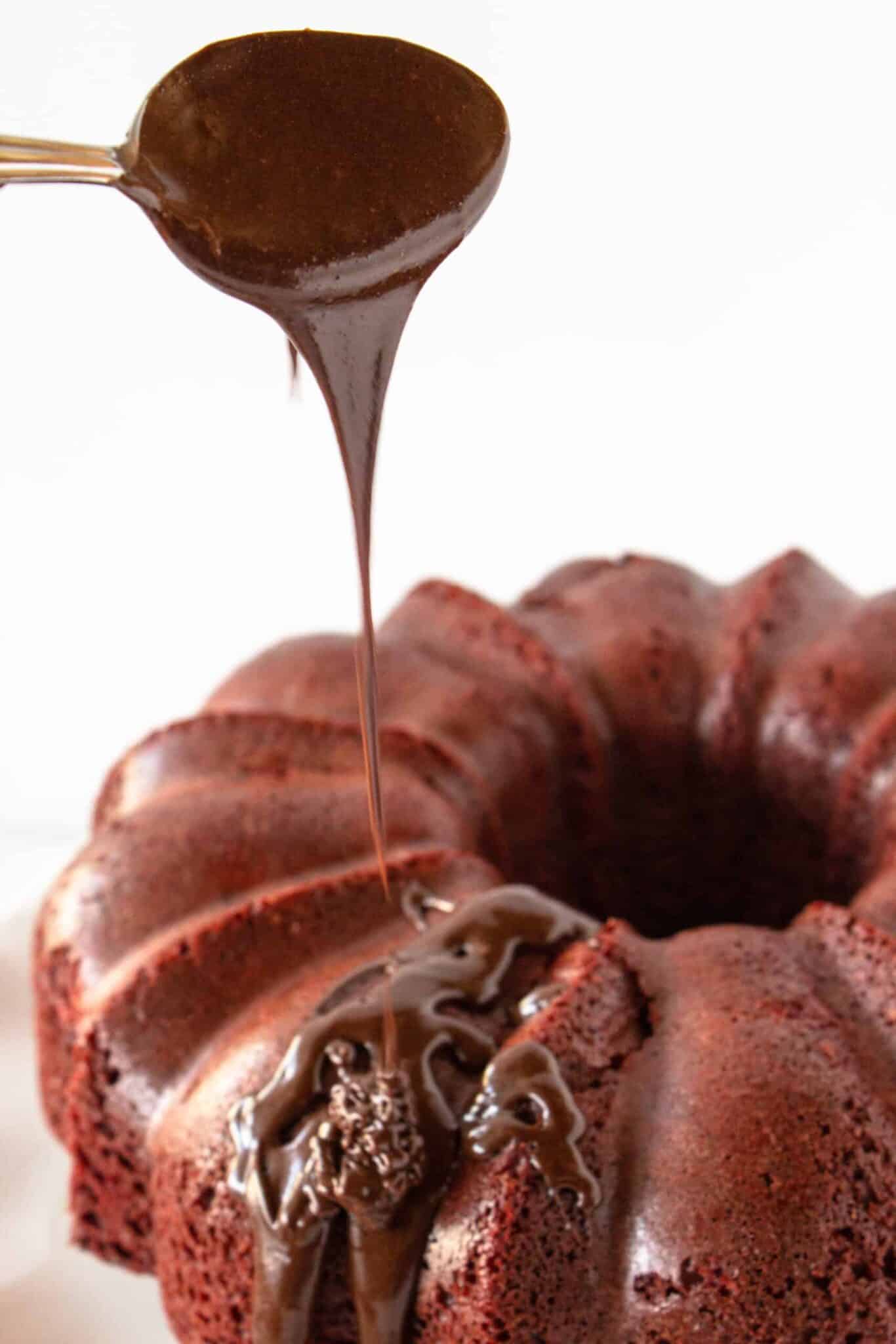 Removing the cake from the bundt pan and adding the chocolate glaze.
