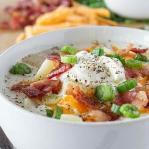 Easy Crock Pot Potato Soup with Cream Cheese Recipe featured by top US food blogger, Practically Homemade