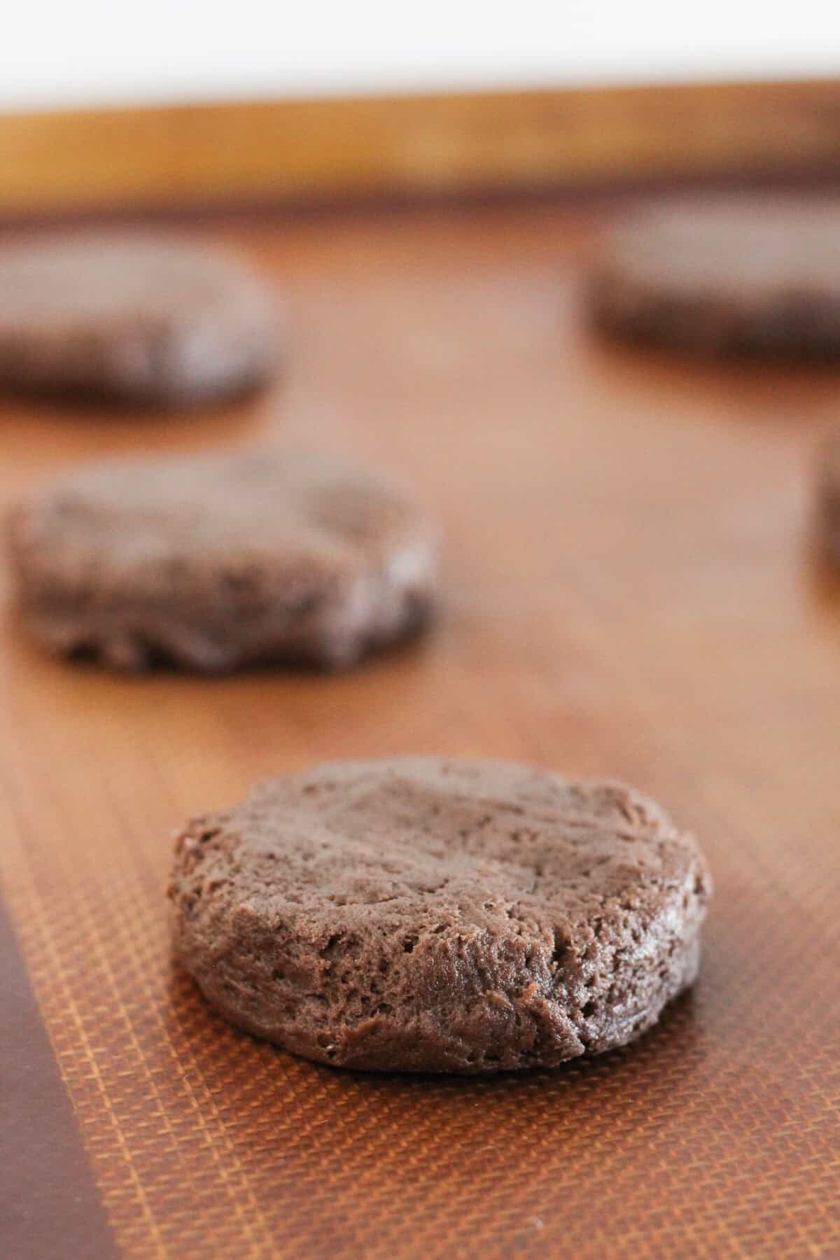 Chocolate cake mix cookie dough on a baking tray.