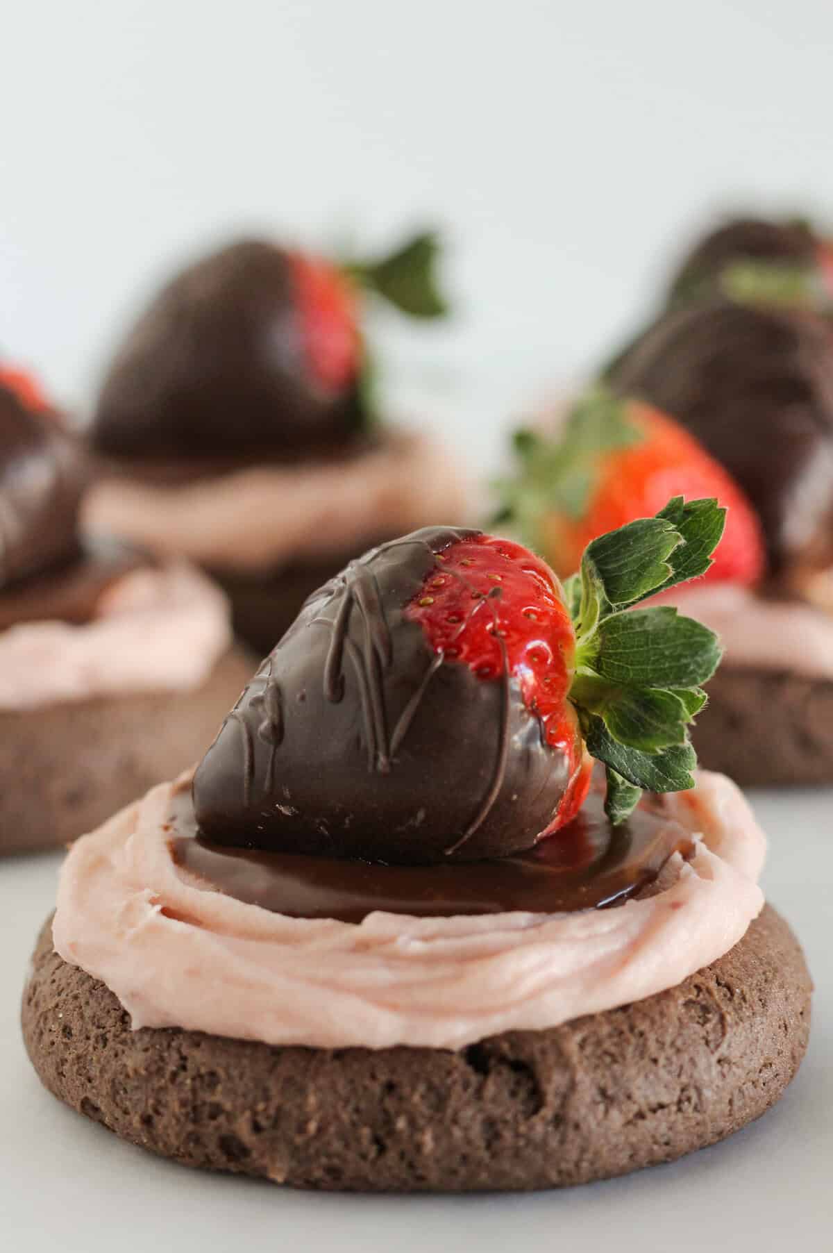 Chocolate covered strawberry cookies made from a cake mix.