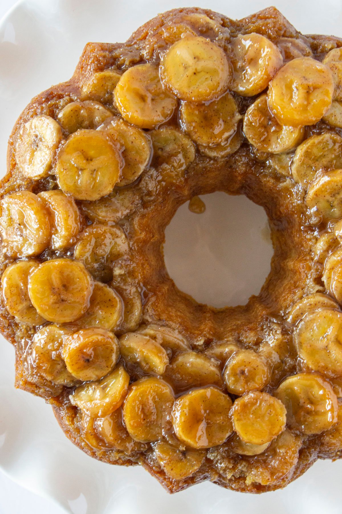 A fresh banana upside down cake before cutting into slices.