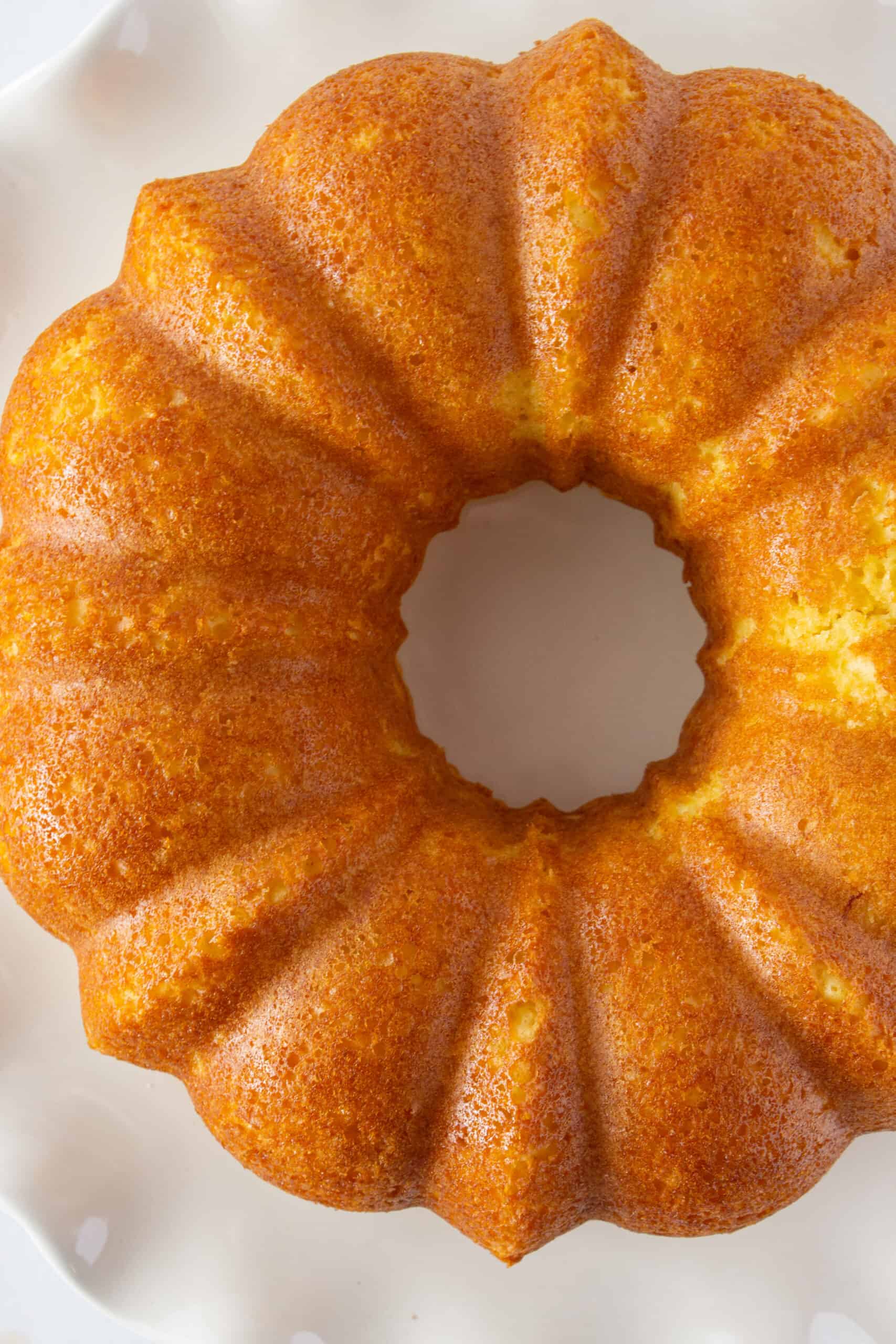 Lemon Pound Bundt Cake Recipe with a Cake Mix featured by top US dessert blogger, Practically Homemade