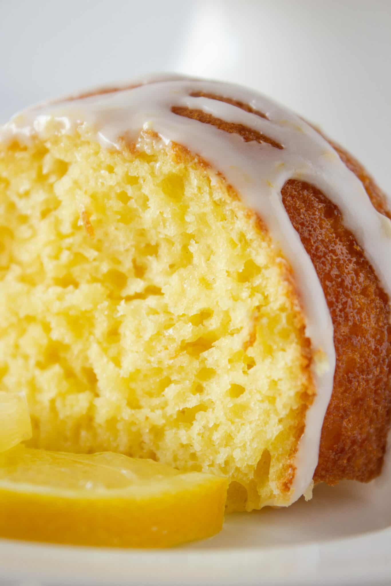 Lemon Pound Bundt Cake Recipe with a Cake Mix featured by top US dessert blogger, Practically Homemade