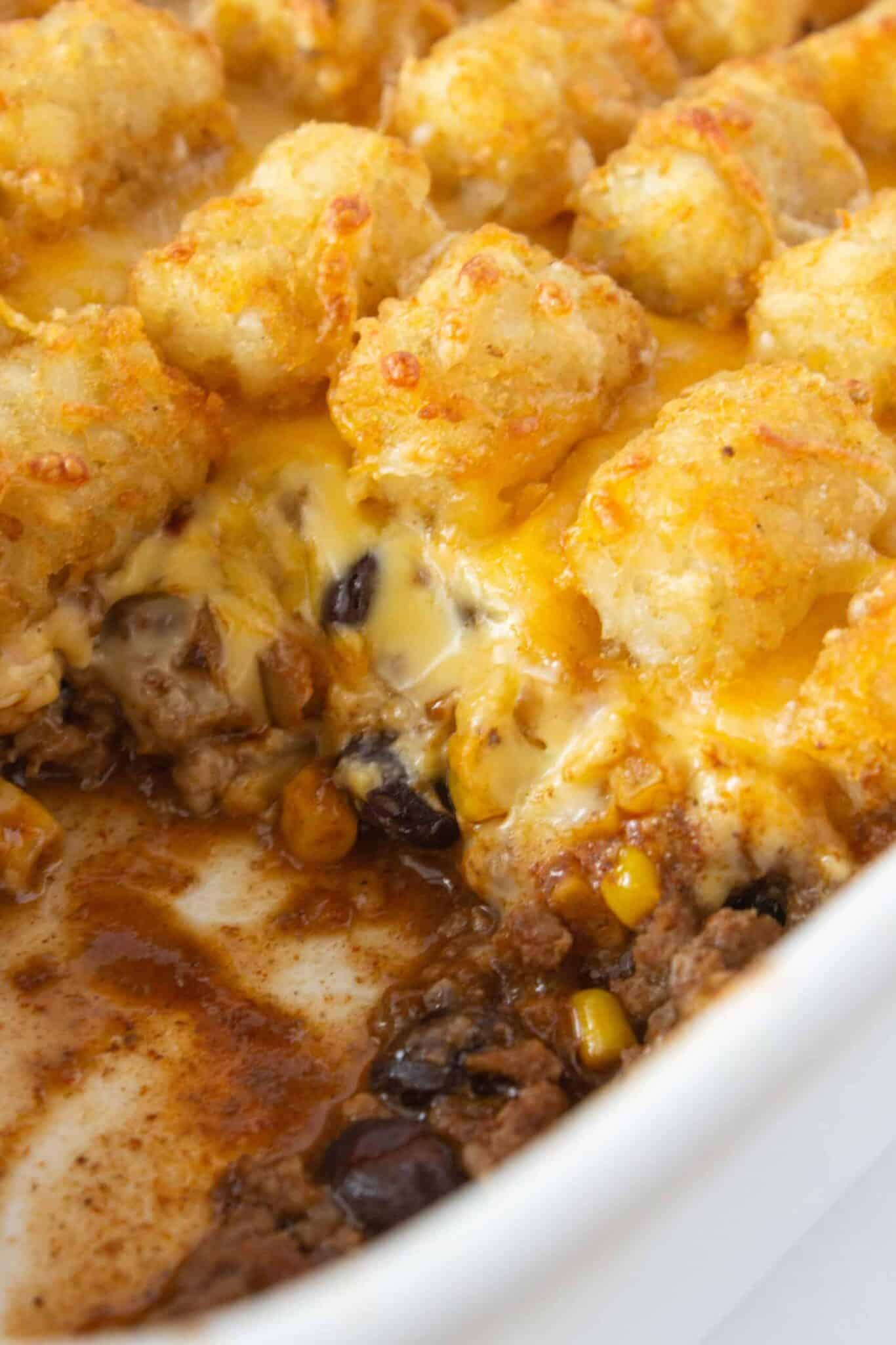 Baking the tater tot casserole until golden brown.