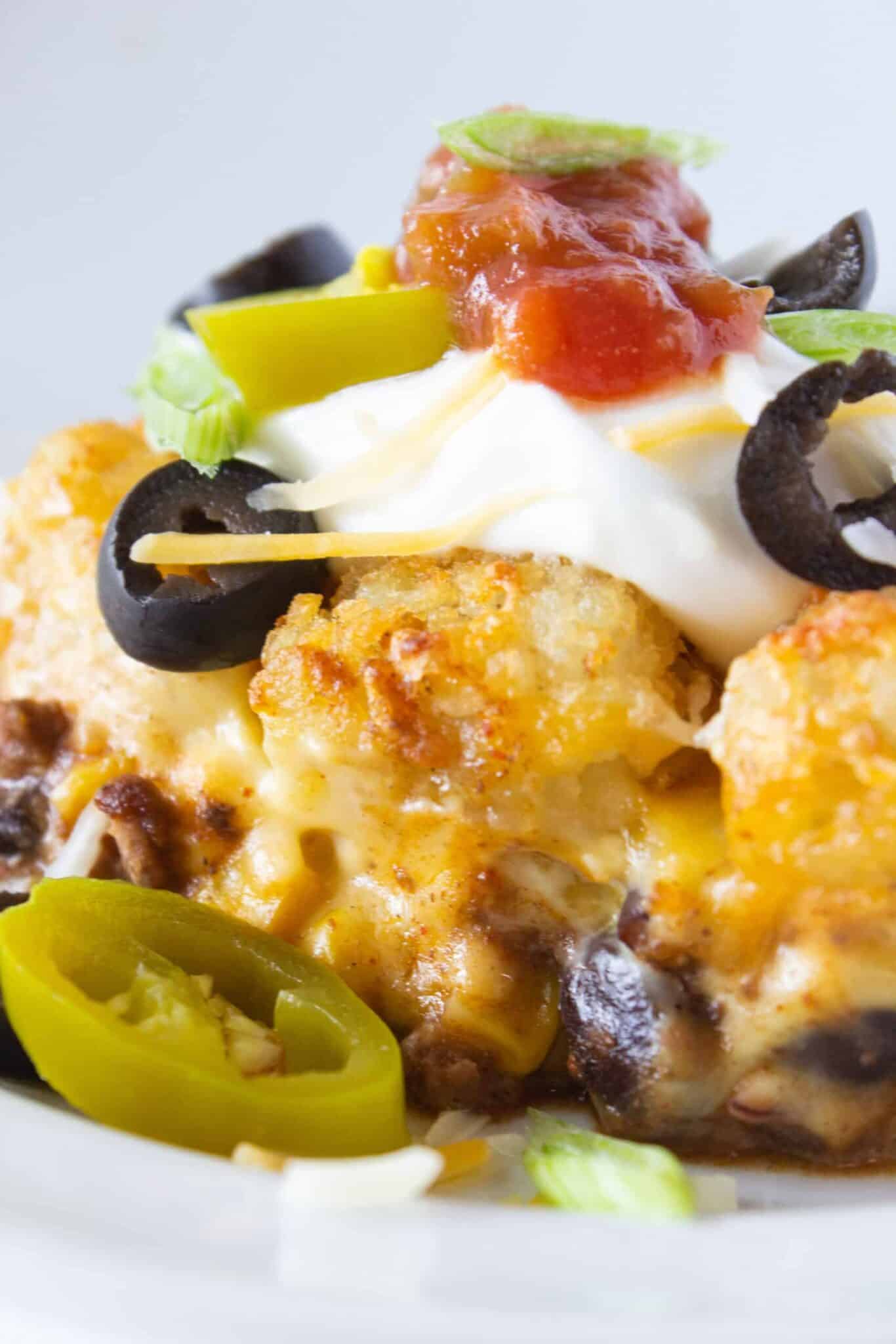 Totcho Casserole with melted cheese and fun toppings.