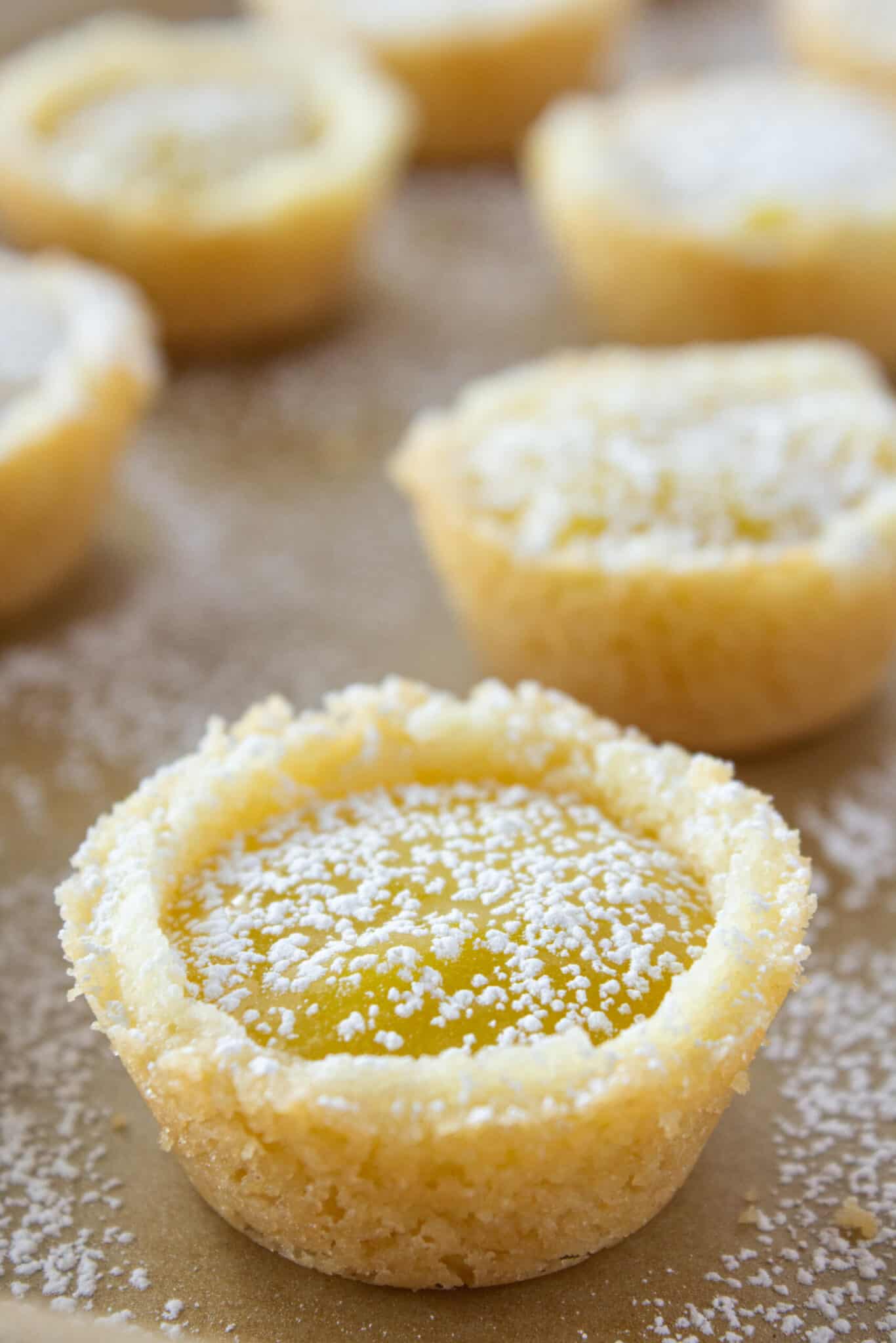 Lemon Bar Cookie Cups Recipe with the Best Sugar Cookie Mix featured by top US cookie blogger, Practically Homemade