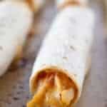 Easy 5 Ingredient Chicken Taquitos recipe featured by top US food blogger, Practically Homemade