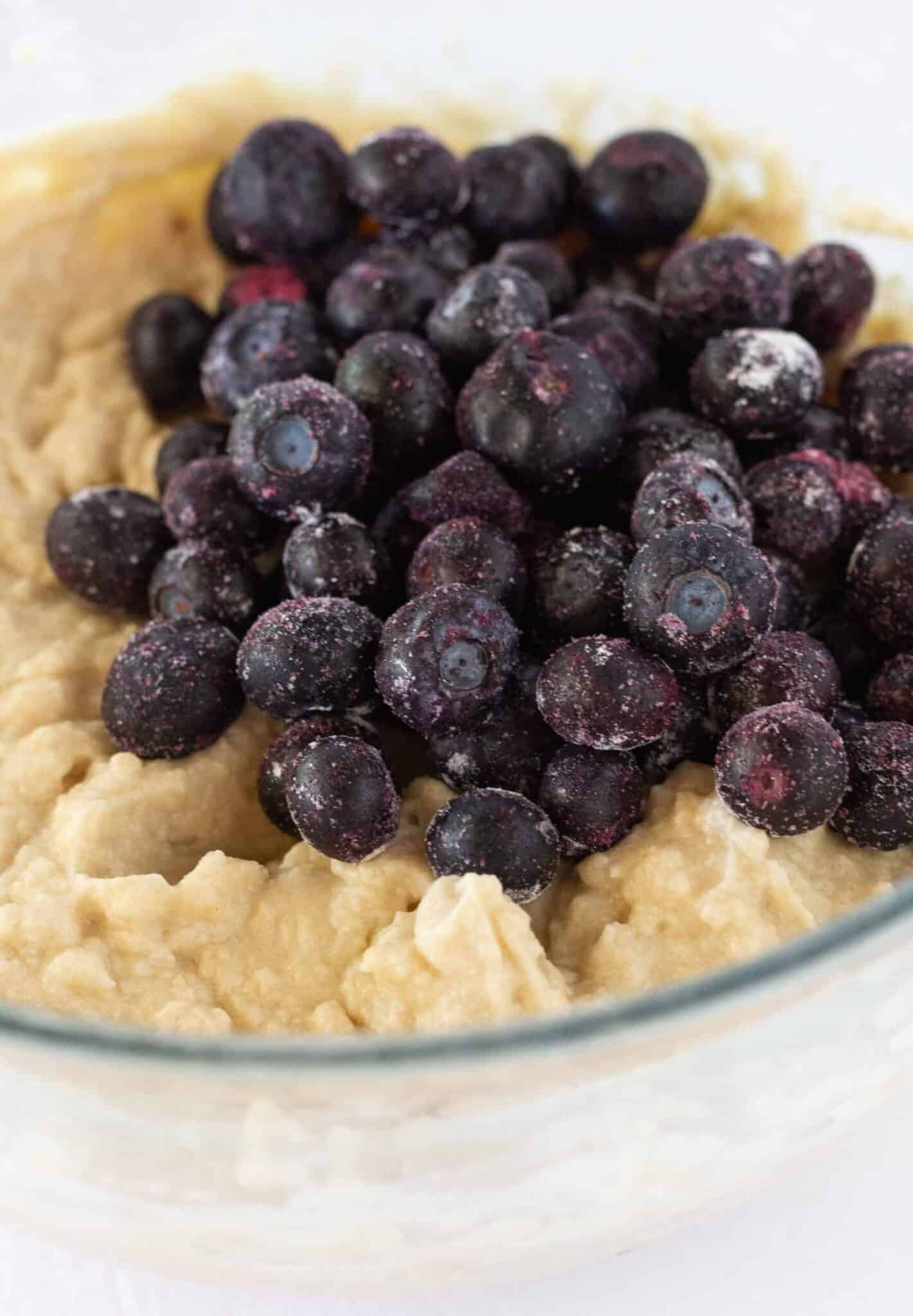Finishing the crumb cake batter and adding blueberries.