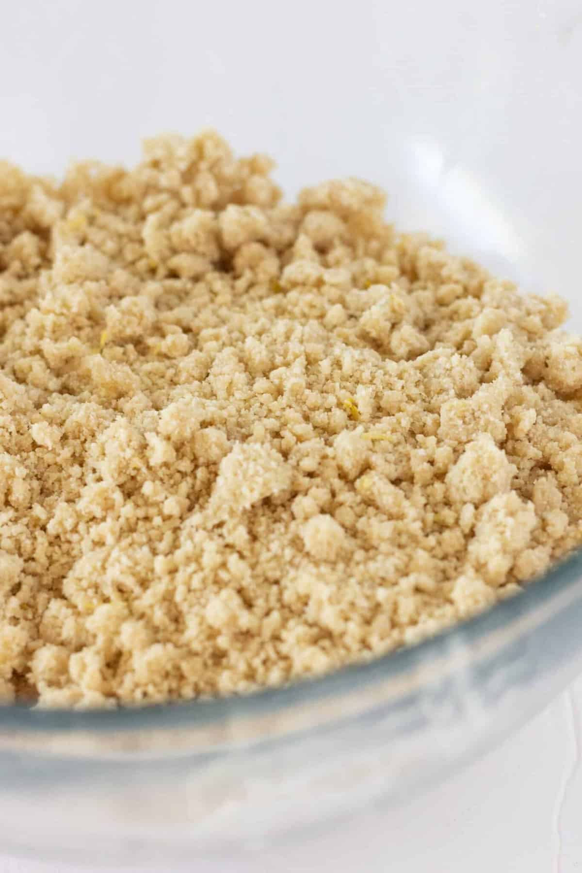 Adding remaining batter and making the crumb mixture.