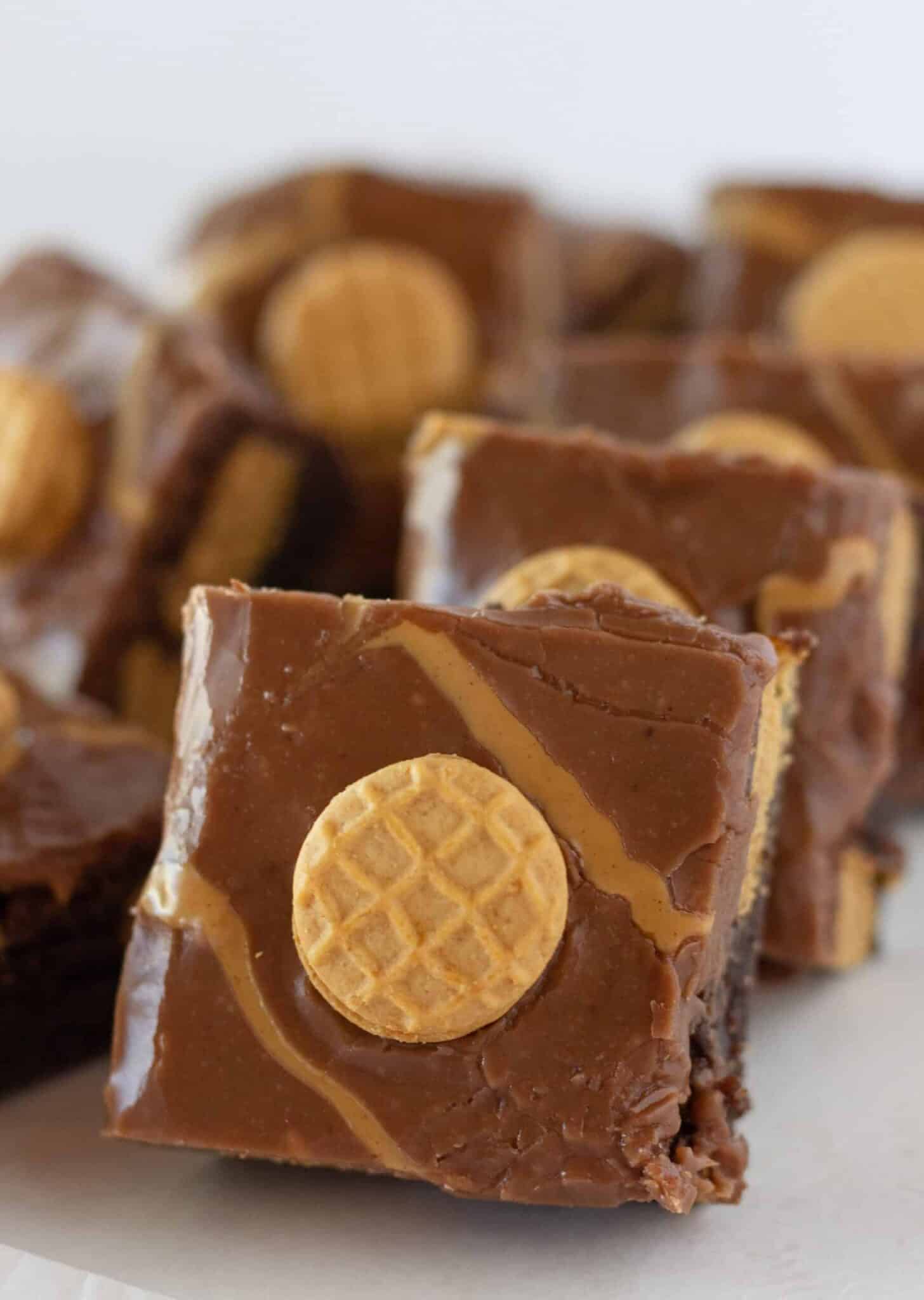Easy Nutter Butter Brownies stacked on each other.
