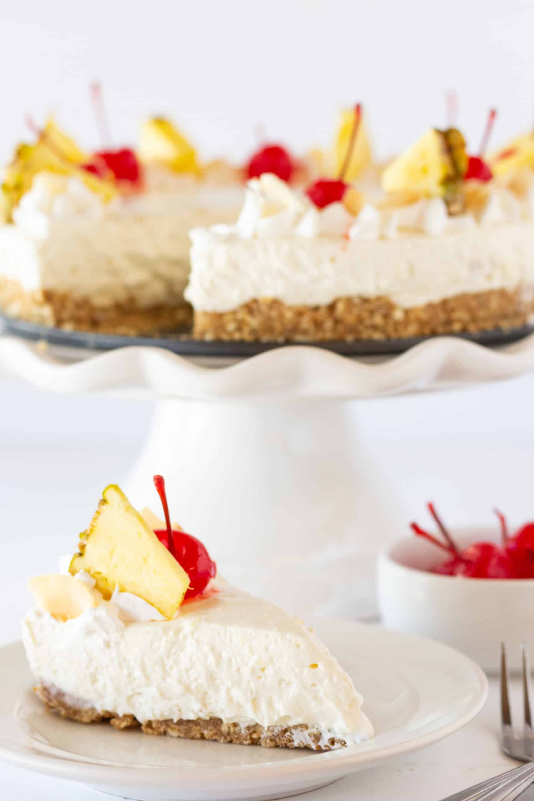 Easy Cheesecakes: Festive Pina Colada Cheesecake Recipe featured by top US dessert blogger, Practically Homemade
