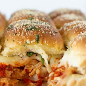 Easy Shredded Chicken Parmesan Sliders featured by top US food blogger, Practically Homemade