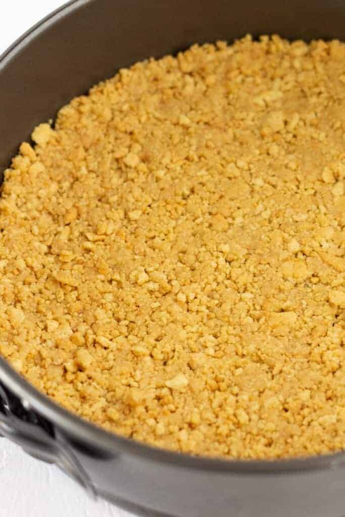 A golden Oero crust in a springform pan.