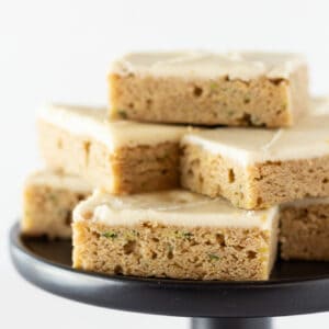 Zucchini Bars Recipe with Cream Cheese Frosting featured by top US dessert blogger, Practically Homemade