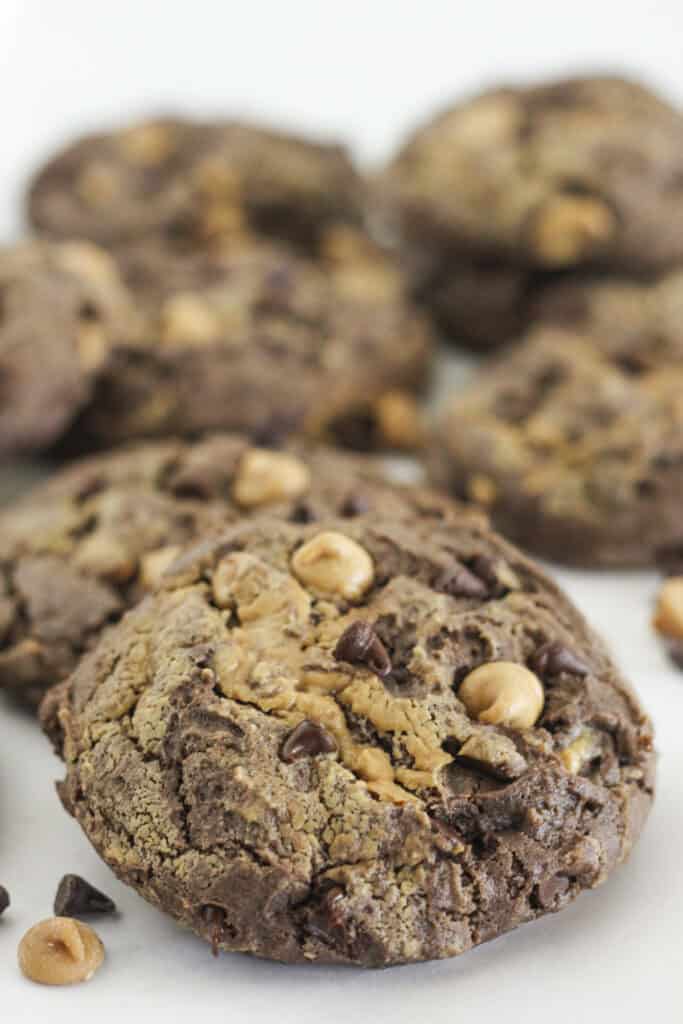 Chocolate cake mix cookies with swirls of peanut butter and peanut butter chips.