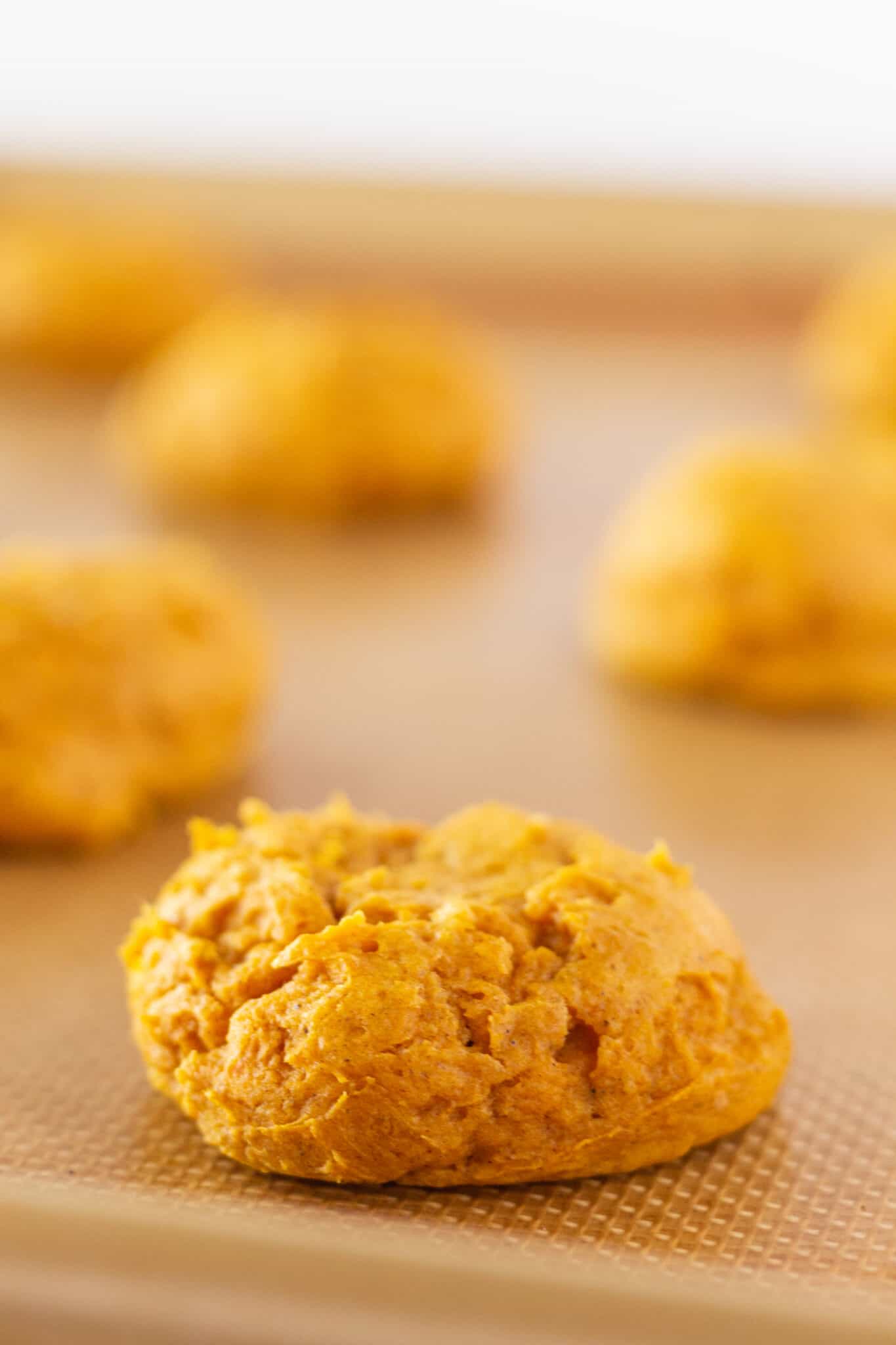 Pumpkin Cream Cheese Cookies Recipe Made with a Cake Mix featured by top US cookie blogger, Practically Homemade