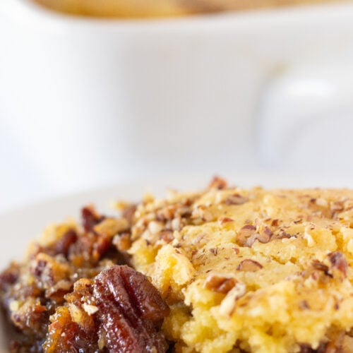 Easy Pecan Pie Cobbler Recipe with a Cake Mix, a fall dessert featured by top US dessert blogger, Practically Homemade.