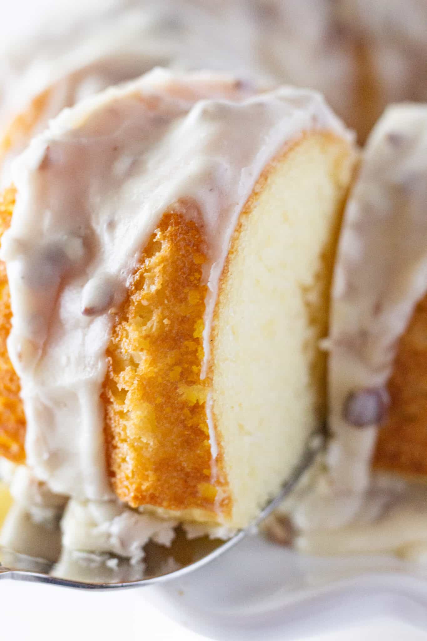 White Texas Sheet Cake Bundt Cake Recipe featured by top US dessert blogger, Practically Homemade