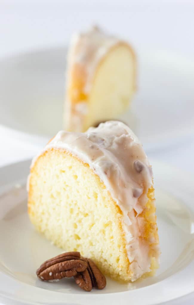 White Texas Sheet Cake Bundt Cake Recipe featured by top US dessert blogger, Practically Homemade