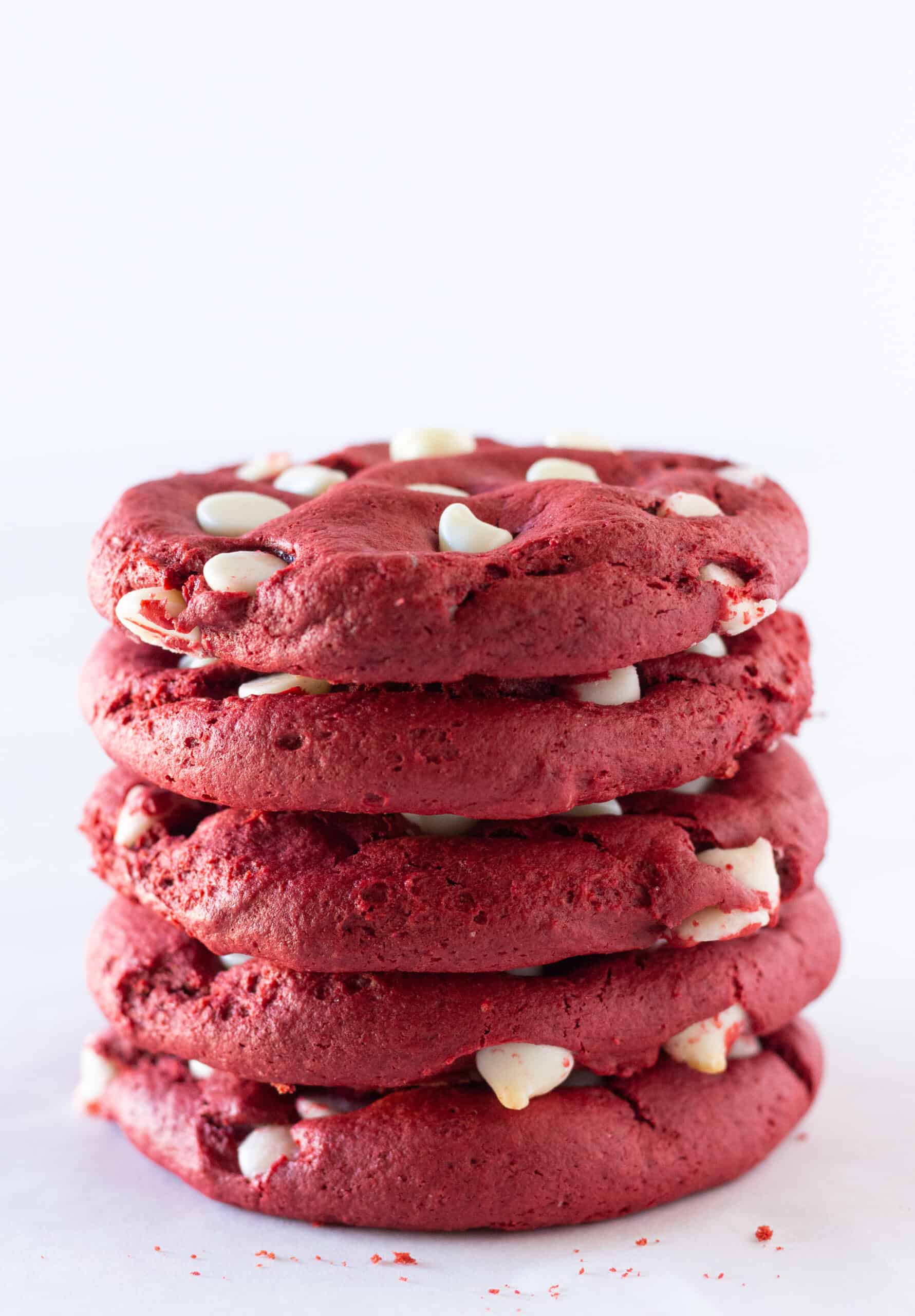 A stack of 5 red velvet and white chocolate cake mix cookies.