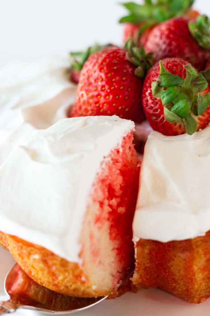Best Bundt Cakes: Strawberry Jello Poke Bundt Cake recipe featured by Practically Homemade