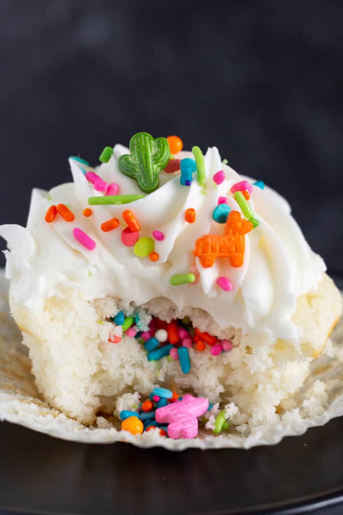 Easy Piñata Cupcakes Recipe with a Cake Mix featured by Practically Homemade