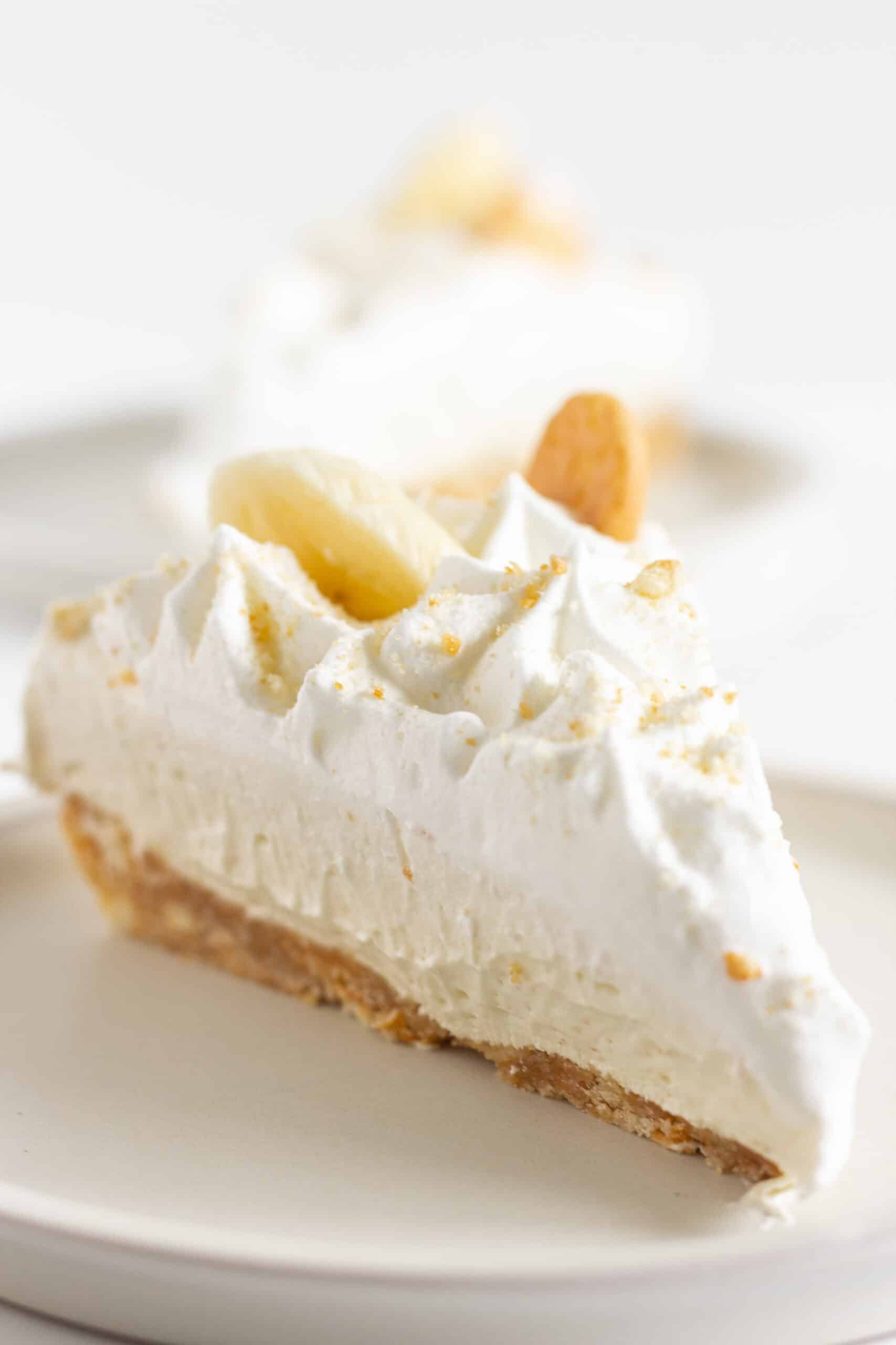 Two slices of no bake banana pudding cheesecake ready to serve.