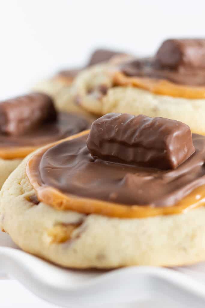 Easy Copycat Crumbl Twix Cookies With a Cake Mix recipe, by Top US cookie blog Practically Homemade
