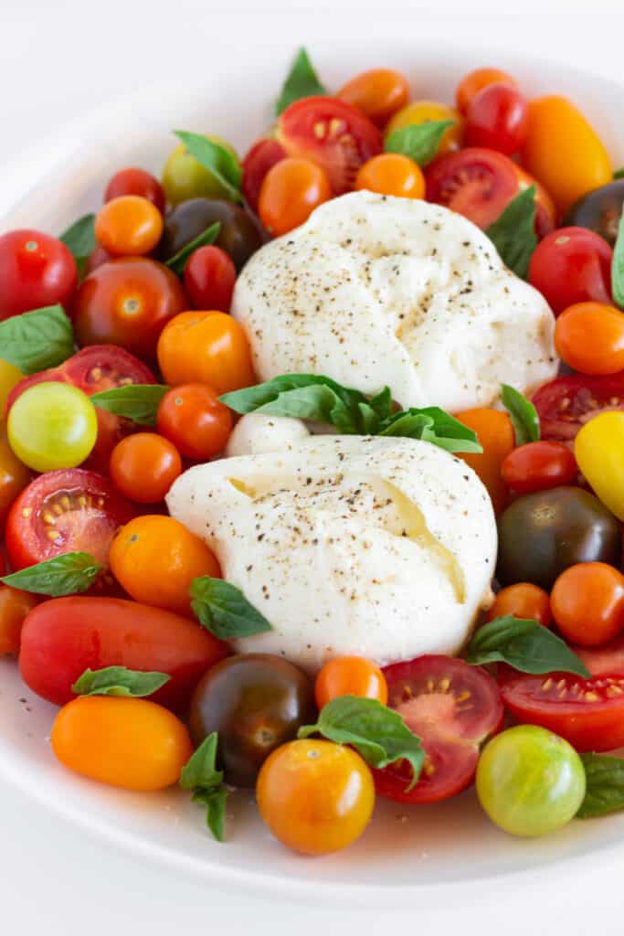 A burrata caprese salad without the balsamic vinaigrette.