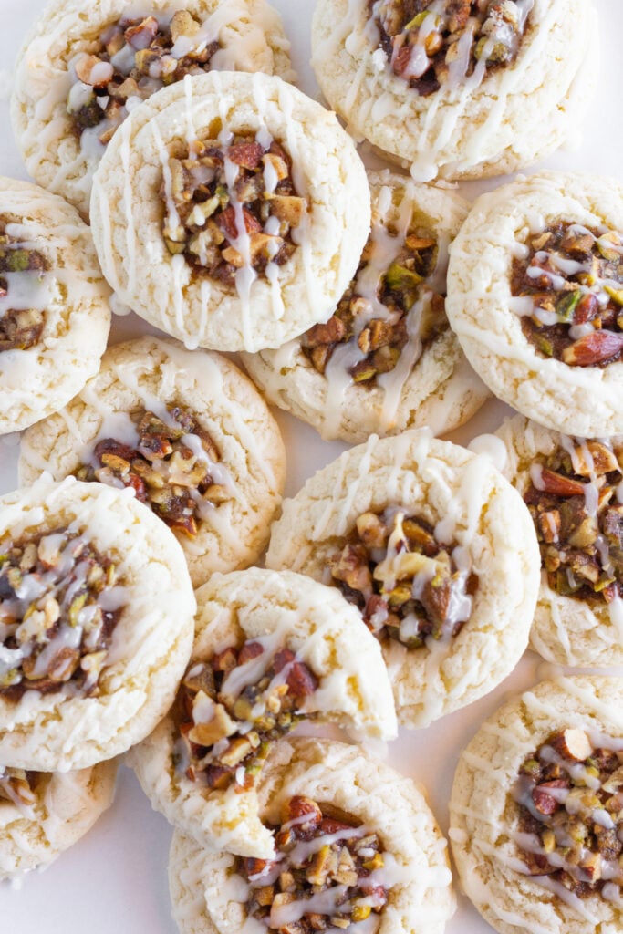 A large tray of Easy Baklava Cookies with a bite taken out of one of the delicious cookies.