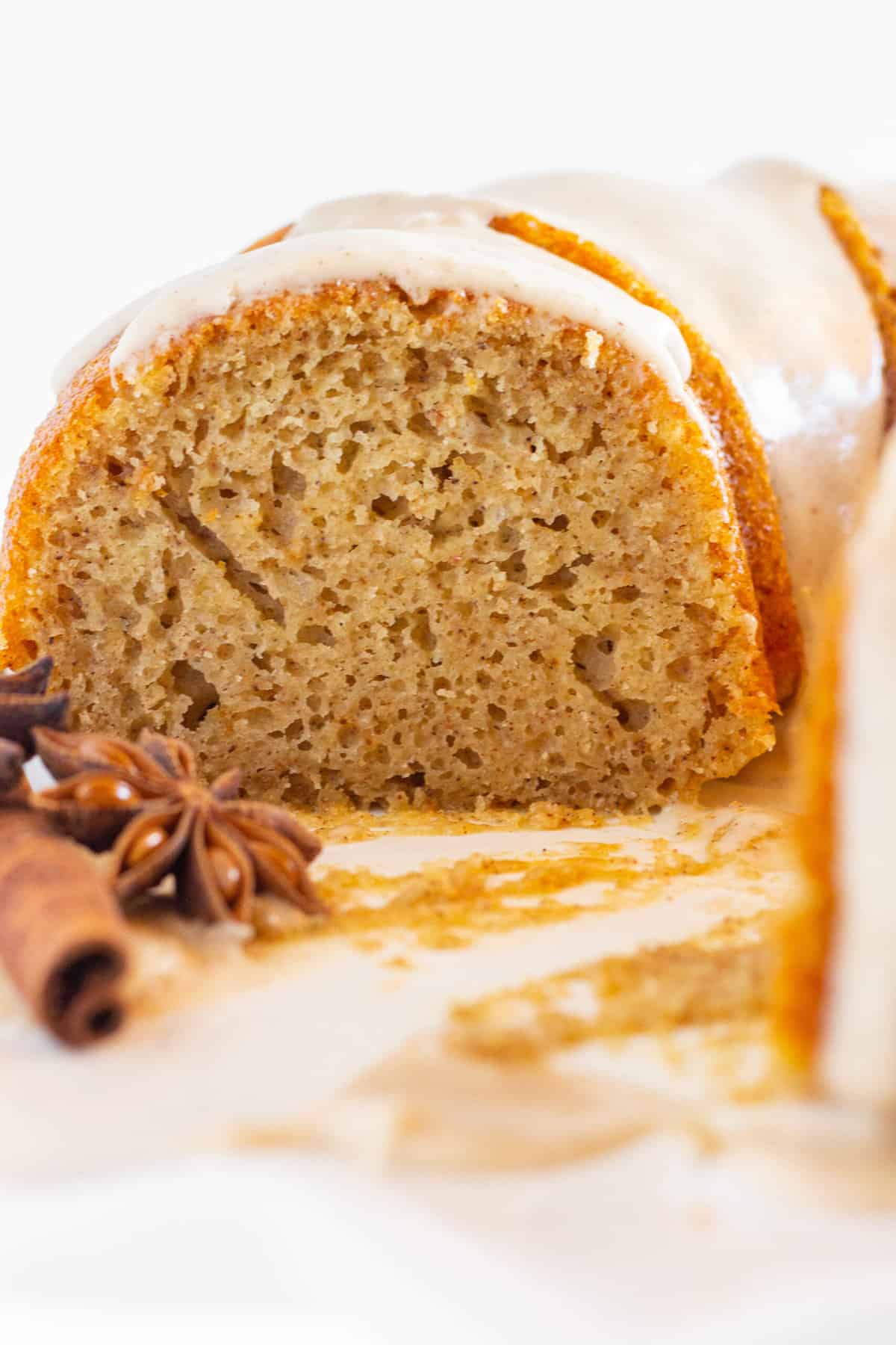 Spice Bundt Cake with a few slices removed and looking into the middle of the cake.