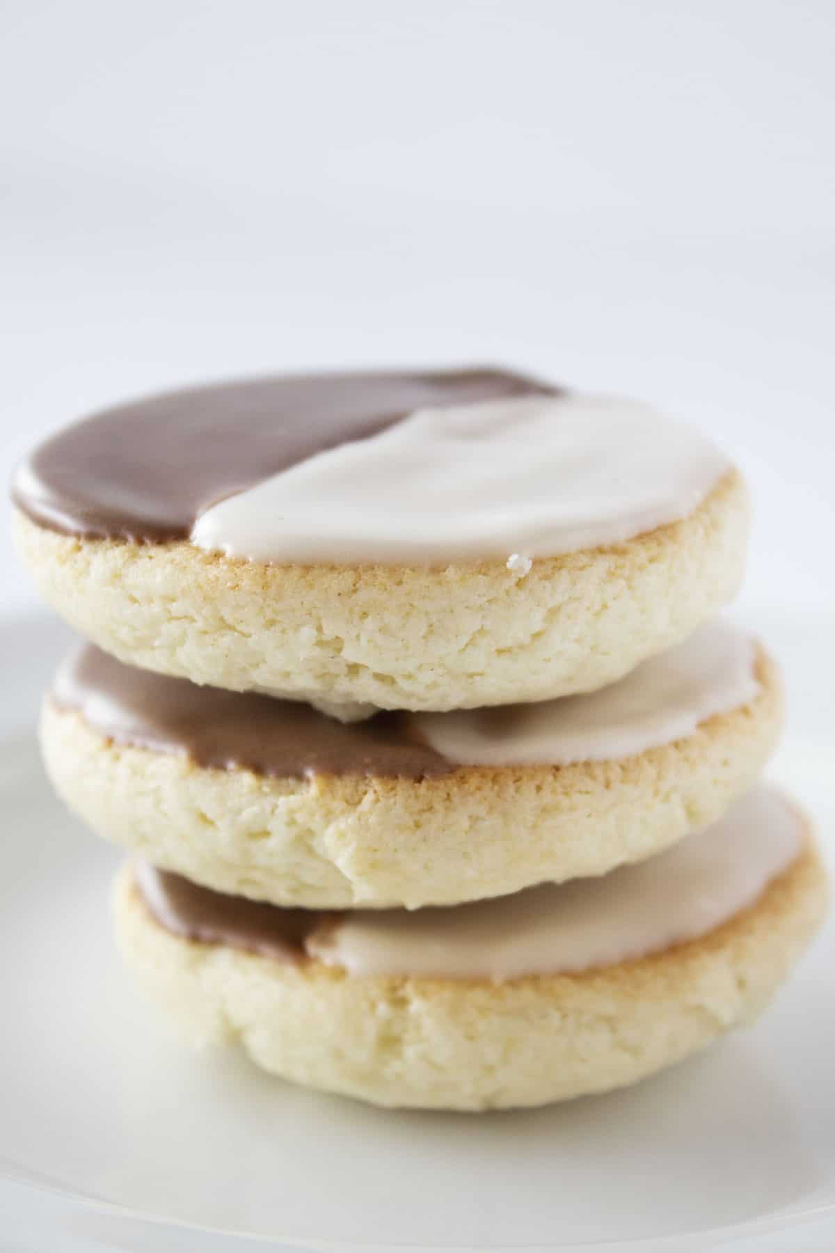 A stack of three Half Moon Black and White Cookies.