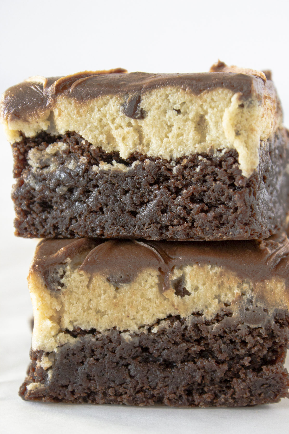 Two Cookie Dough Brownies stacked on top of each other.