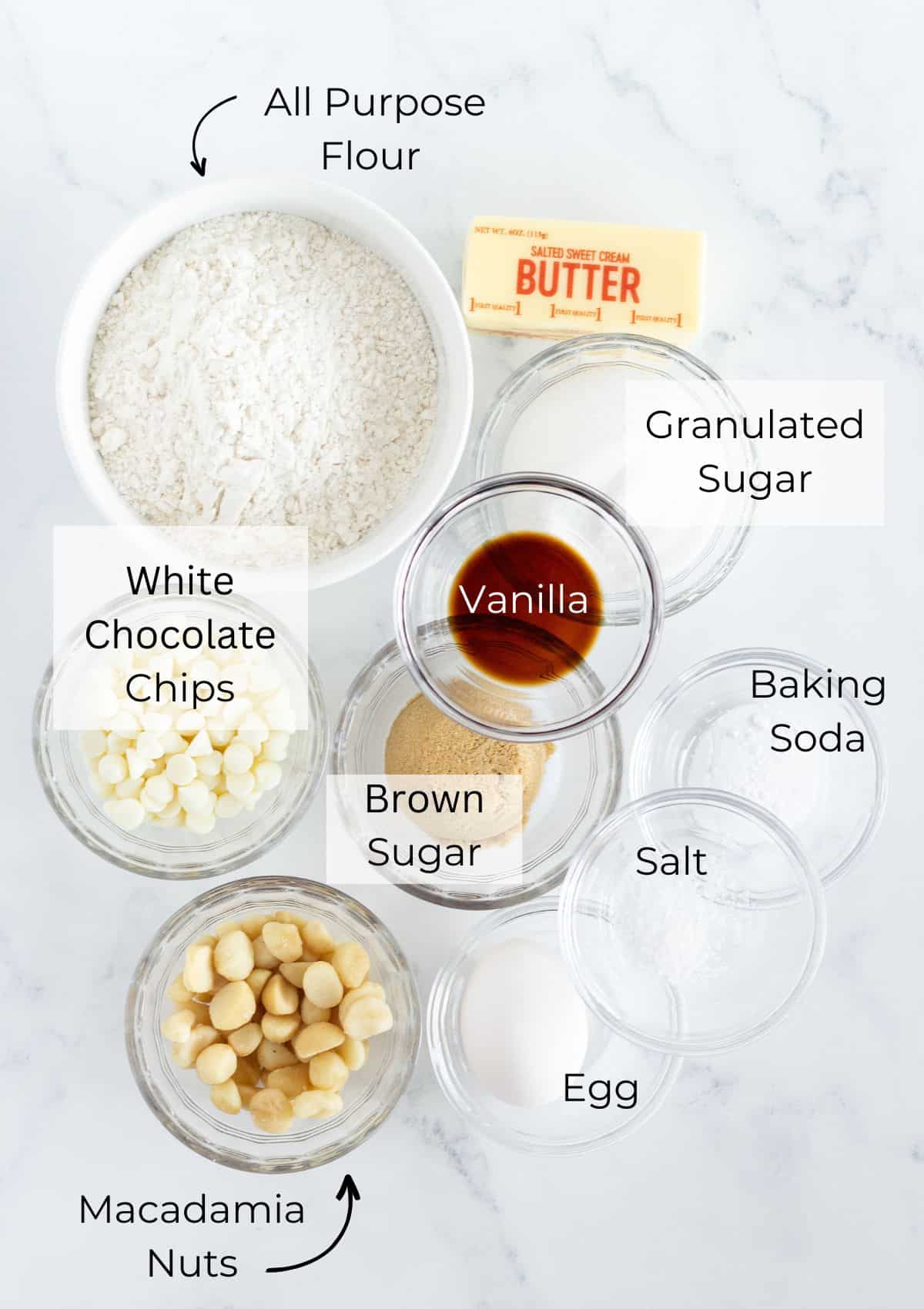 A photo of all of the ingredients needed to make Soft White Chocolate Macadamia Cookies.