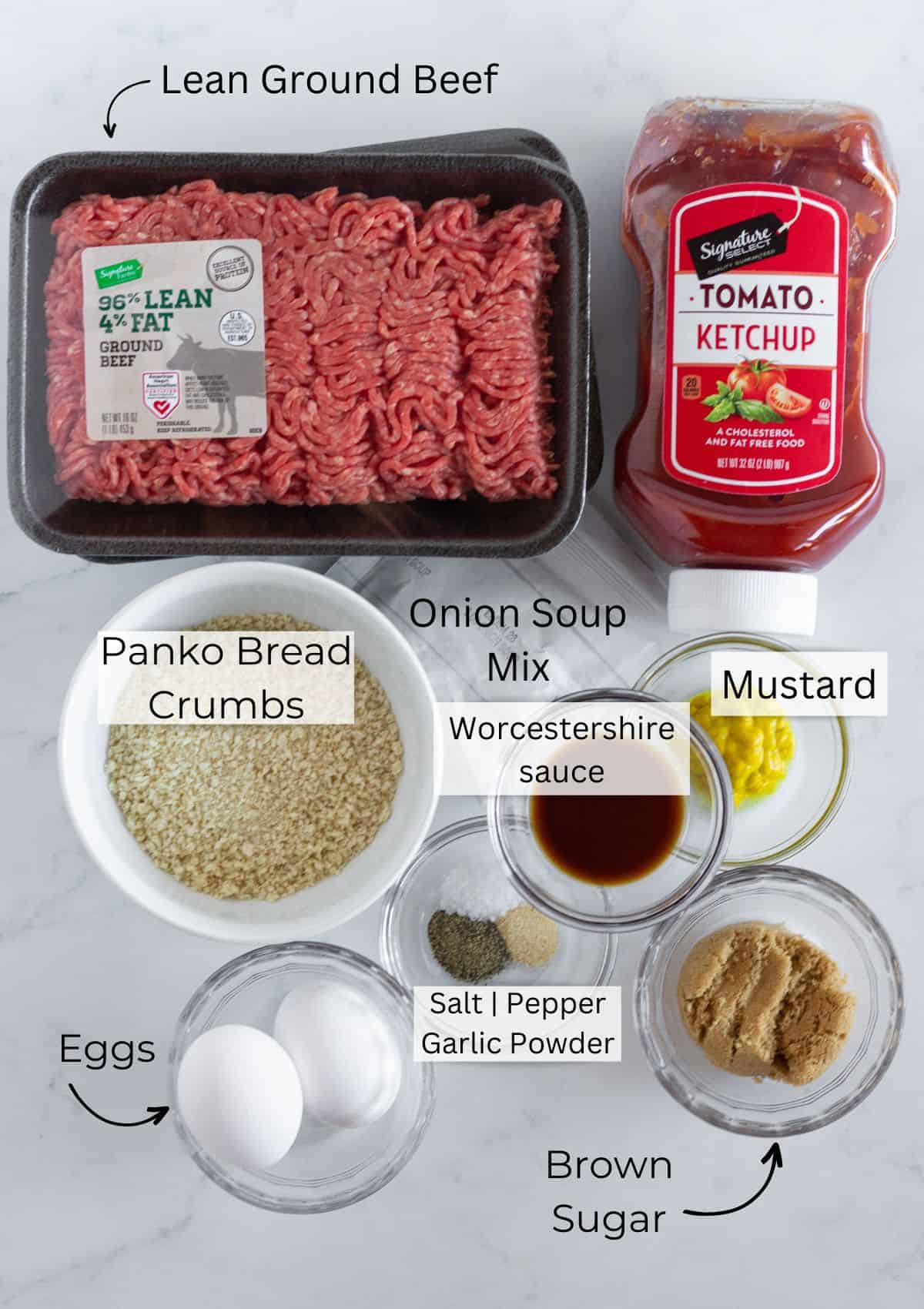 All of the ingredients needed to make a meatloaf in the crock pot.
