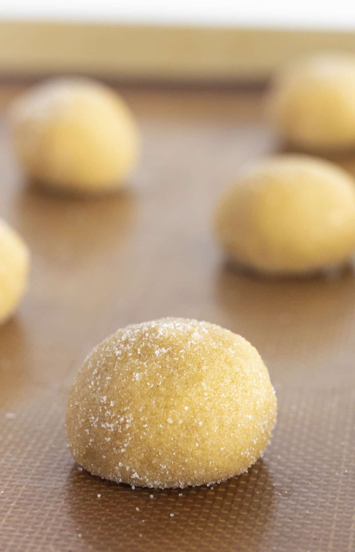 Cookie dough balls that were made with a cookie scoop.