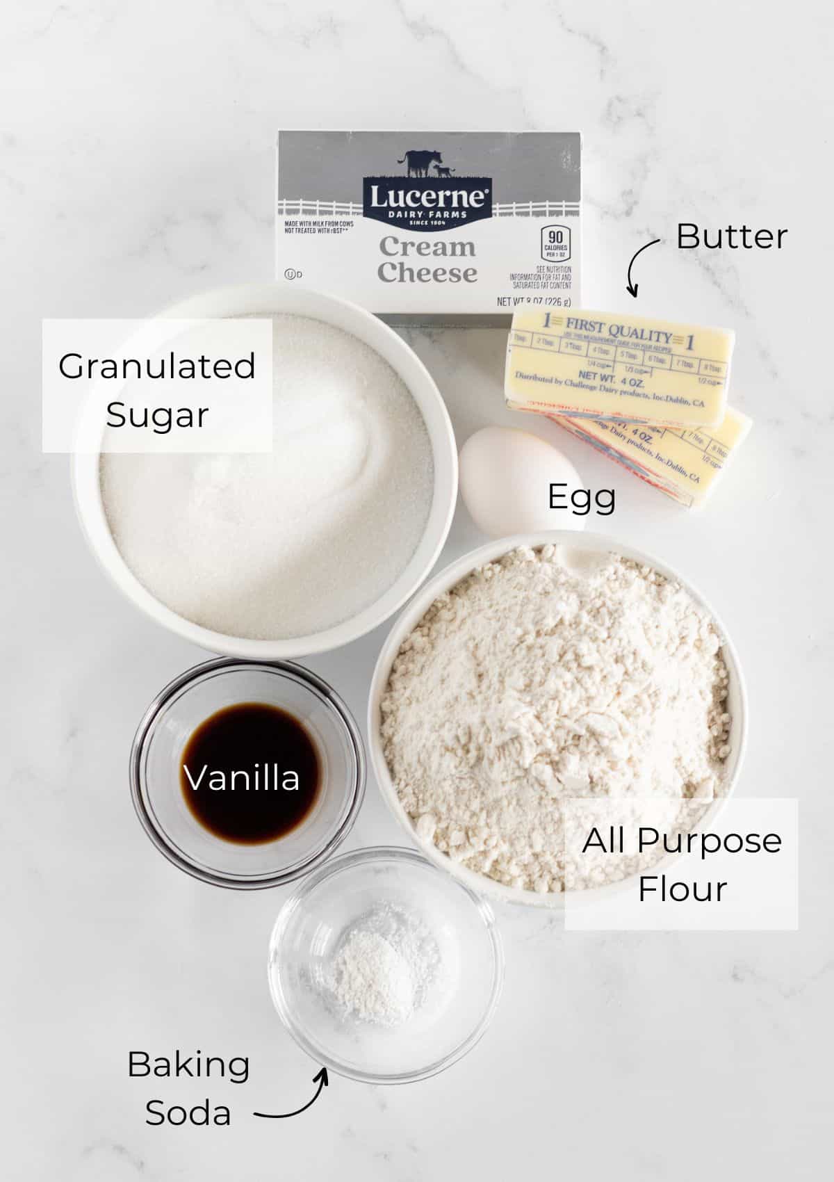 All of the ingredients needed to make cream cheese sugar cookies.