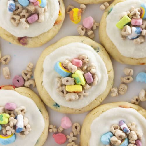 A dozen Lucky Charm Cookies with cereal milk frosting.