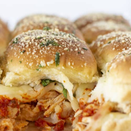 Looking at the inside of baked Chicken Parmesan Sliders.