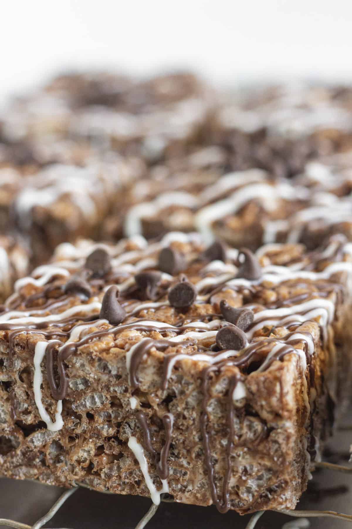 A close up photo showing the chocolate drizzle of each square.