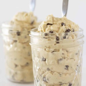 Edible Cookie Dough served in jars with spoons.
