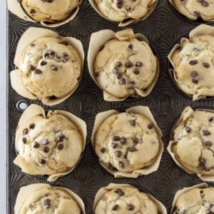 Looking down on a dozen pancake mix muffins in a pan.