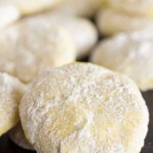Moist and delicious Lemon Cooler Cookies on a black tray.