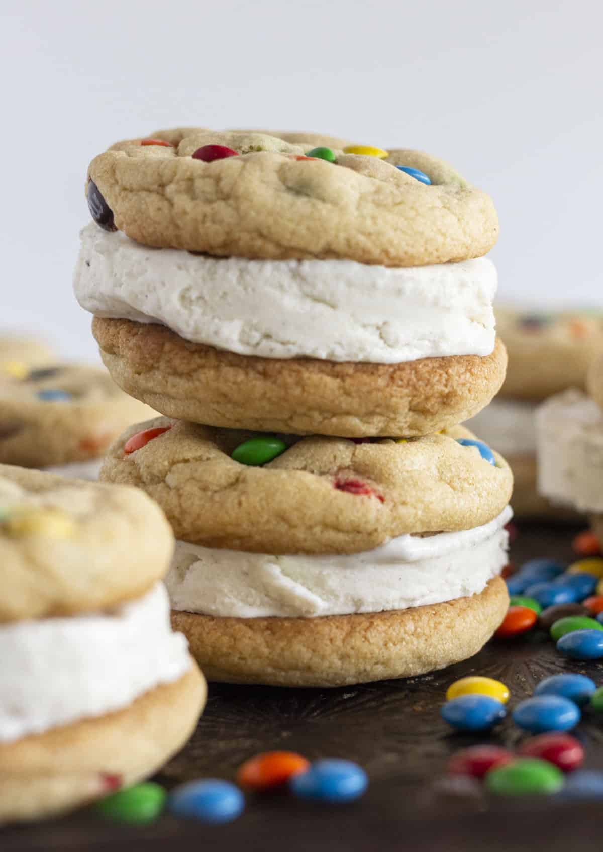Two M&M Ice Cream Sandwiches stacked on top of each other.