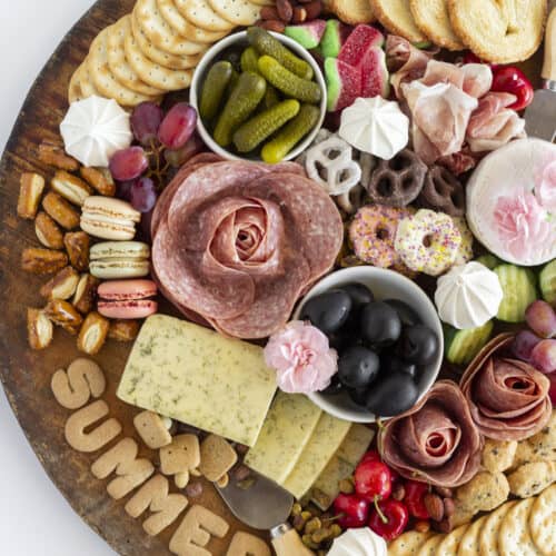 An overhead shot of a finished summer charcuterie board.