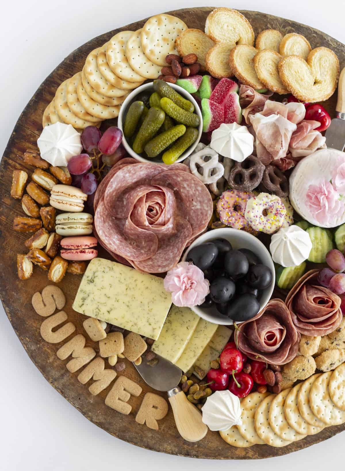 An overhead shot of the finished summer charcuterie board.