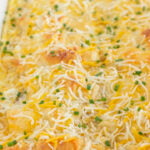 Baked ham breakfast casserole with chopped chives.