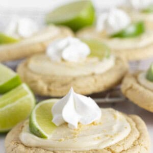 A dozen Key Lime Cookies on a cooling rack.